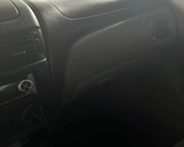 Зелений Ніссан Альмера, об'ємом двигуна 1.8 л та пробігом 340 тис. км за 3100 $, фото 5 на Automoto.ua