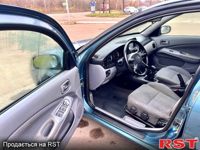 Зелений Ніссан Альмера, об'ємом двигуна 1.8 л та пробігом 217 тис. км за 2800 $, фото 10 на Automoto.ua