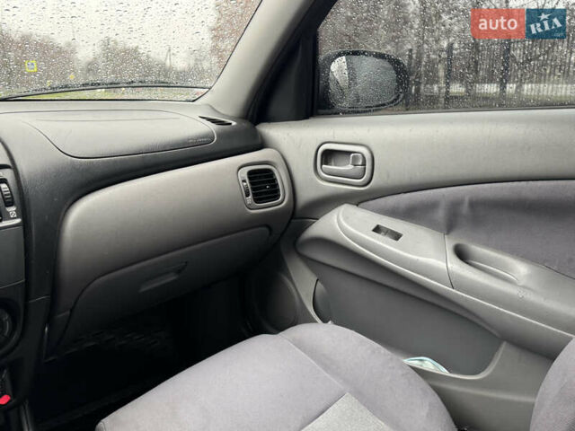 Зеленый Ниссан Альмера, объемом двигателя 1.5 л и пробегом 270 тыс. км за 3700 $, фото 24 на Automoto.ua