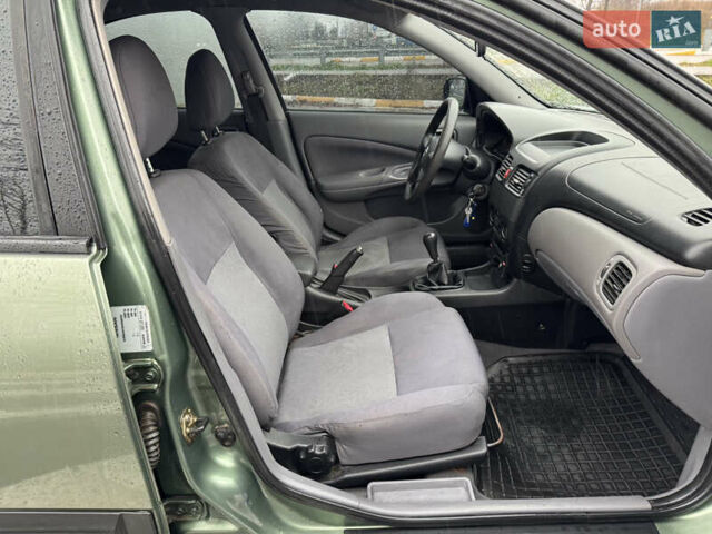 Зеленый Ниссан Альмера, объемом двигателя 1.5 л и пробегом 270 тыс. км за 3700 $, фото 17 на Automoto.ua