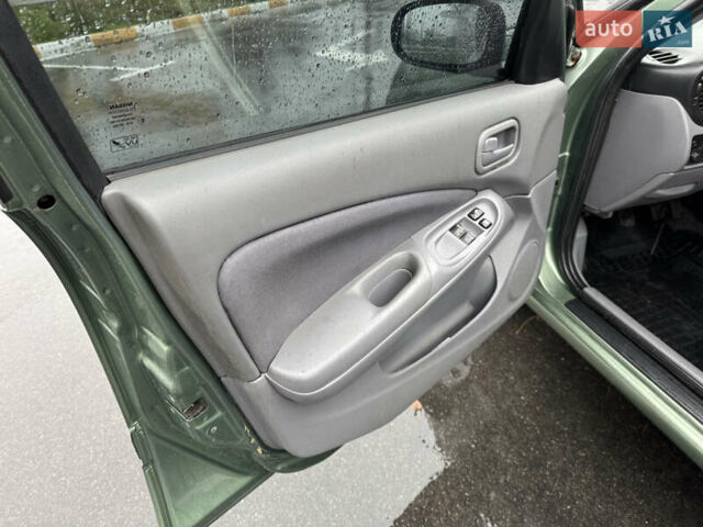 Зеленый Ниссан Альмера, объемом двигателя 1.5 л и пробегом 270 тыс. км за 3700 $, фото 14 на Automoto.ua