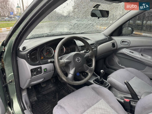Зеленый Ниссан Альмера, объемом двигателя 1.5 л и пробегом 270 тыс. км за 3700 $, фото 12 на Automoto.ua