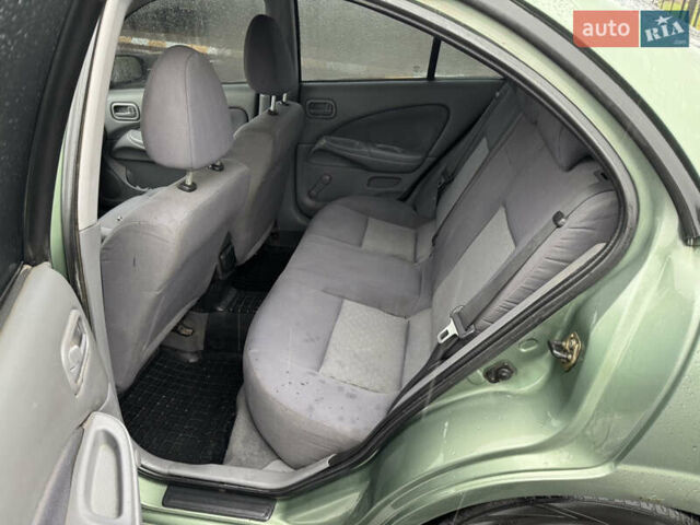 Зеленый Ниссан Альмера, объемом двигателя 1.5 л и пробегом 270 тыс. км за 3700 $, фото 16 на Automoto.ua