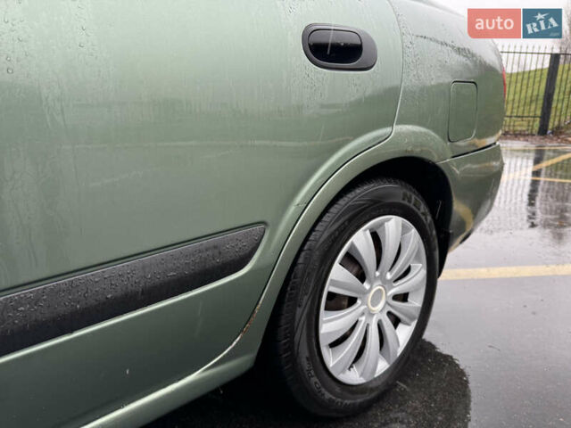 Зеленый Ниссан Альмера, объемом двигателя 1.5 л и пробегом 270 тыс. км за 3700 $, фото 29 на Automoto.ua