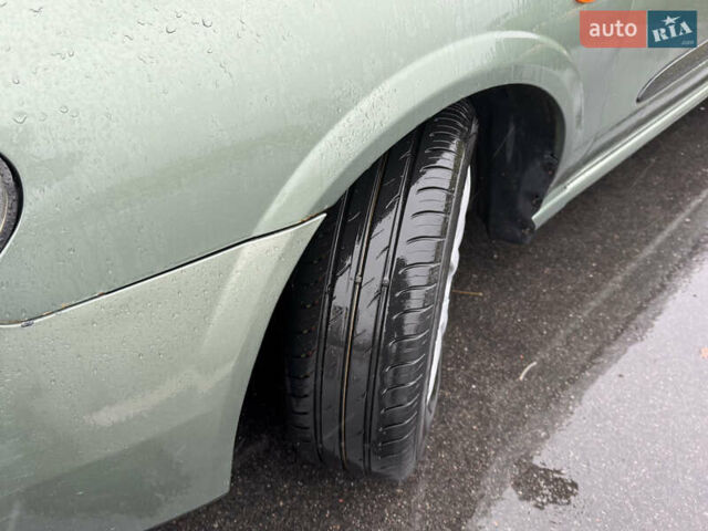 Зеленый Ниссан Альмера, объемом двигателя 1.5 л и пробегом 270 тыс. км за 3700 $, фото 13 на Automoto.ua