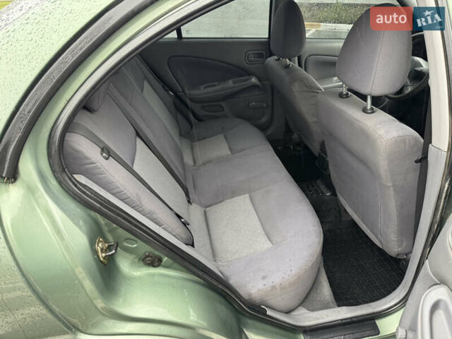 Зеленый Ниссан Альмера, объемом двигателя 1.5 л и пробегом 270 тыс. км за 3700 $, фото 18 на Automoto.ua