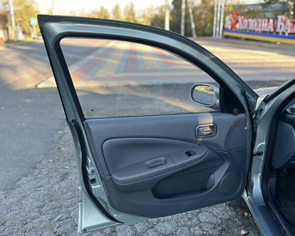 Зелений Ніссан Альмера, об'ємом двигуна 1.6 л та пробігом 130 тис. км за 5900 $, фото 2 на Automoto.ua