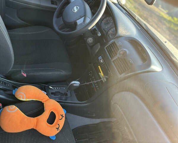 Зелений Ніссан Альмера, об'ємом двигуна 1.6 л та пробігом 130 тис. км за 5900 $, фото 3 на Automoto.ua