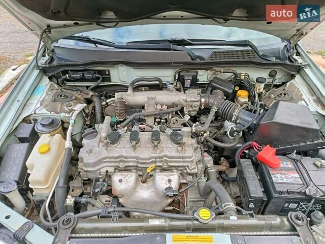 Зеленый Ниссан Альмера, объемом двигателя 1.6 л и пробегом 191 тыс. км за 5700 $, фото 8 на Automoto.ua