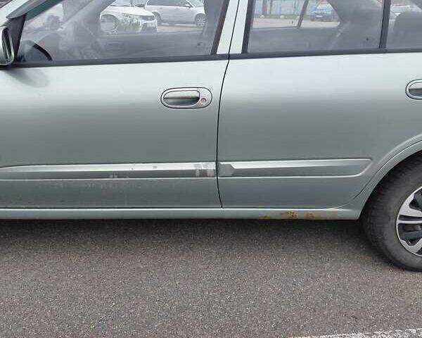 Зеленый Ниссан Альмера, объемом двигателя 1.6 л и пробегом 233 тыс. км за 3700 $, фото 9 на Automoto.ua