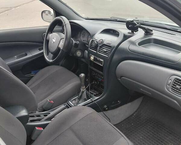 Зеленый Ниссан Альмера, объемом двигателя 1.6 л и пробегом 233 тыс. км за 3700 $, фото 5 на Automoto.ua