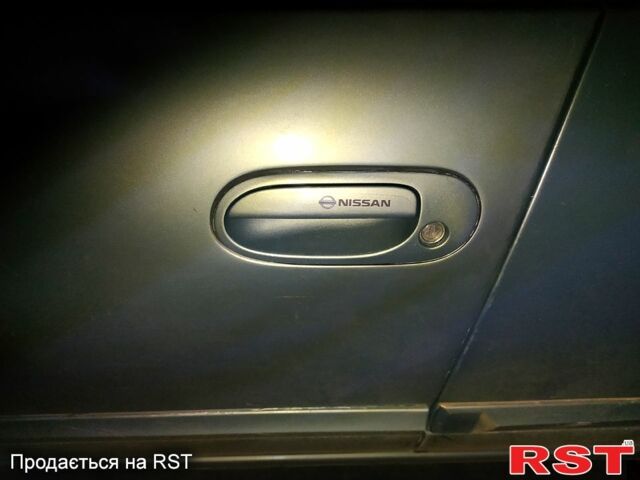 Зеленый Ниссан Альмера, объемом двигателя 1.6 л и пробегом 230 тыс. км за 4699 $, фото 3 на Automoto.ua