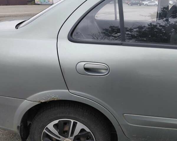 Зеленый Ниссан Альмера, объемом двигателя 1.6 л и пробегом 233 тыс. км за 3700 $, фото 4 на Automoto.ua