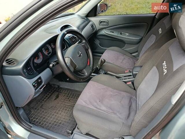 Зеленый Ниссан Альмера, объемом двигателя 1.6 л и пробегом 191 тыс. км за 5700 $, фото 14 на Automoto.ua