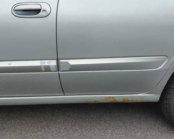 Зеленый Ниссан Альмера, объемом двигателя 1.6 л и пробегом 233 тыс. км за 3700 $, фото 10 на Automoto.ua