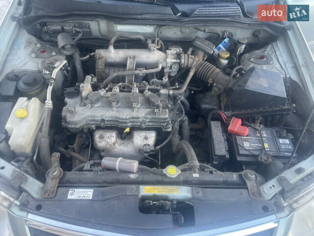 Зеленый Ниссан Альмера, объемом двигателя 1.6 л и пробегом 233 тыс. км за 3450 $, фото 13 на Automoto.ua