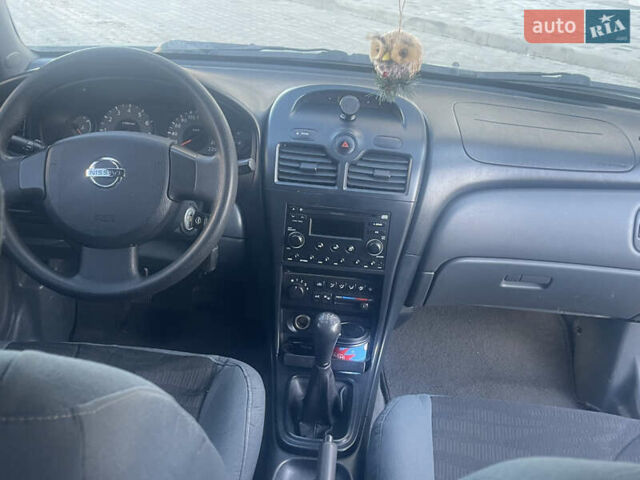 Зеленый Ниссан Альмера, объемом двигателя 1.6 л и пробегом 233 тыс. км за 3450 $, фото 4 на Automoto.ua