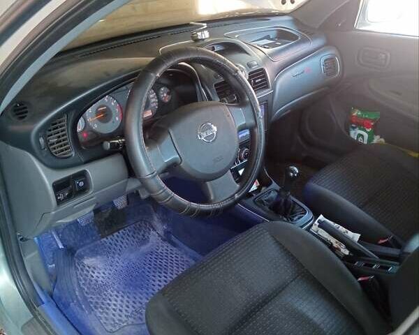 Зеленый Ниссан Альмера, объемом двигателя 1.6 л и пробегом 200 тыс. км за 4200 $, фото 6 на Automoto.ua