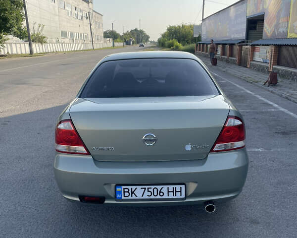 Зеленый Ниссан Альмера, объемом двигателя 1.6 л и пробегом 225 тыс. км за 5800 $, фото 9 на Automoto.ua