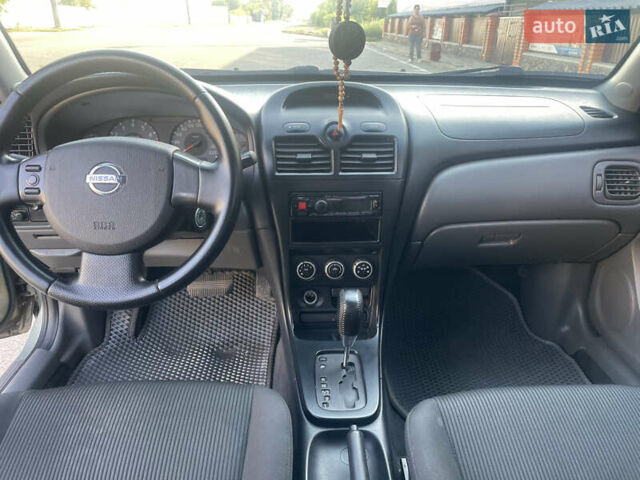Зеленый Ниссан Альмера, объемом двигателя 1.6 л и пробегом 225 тыс. км за 5800 $, фото 11 на Automoto.ua