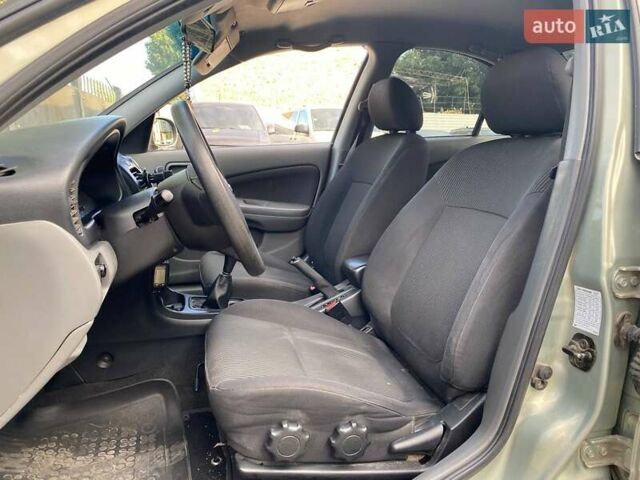 Зелений Ніссан Альмера, об'ємом двигуна 1.6 л та пробігом 75 тис. км за 5990 $, фото 8 на Automoto.ua