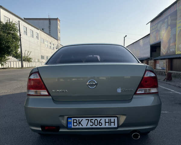 Зеленый Ниссан Альмера, объемом двигателя 1.6 л и пробегом 225 тыс. км за 5800 $, фото 8 на Automoto.ua