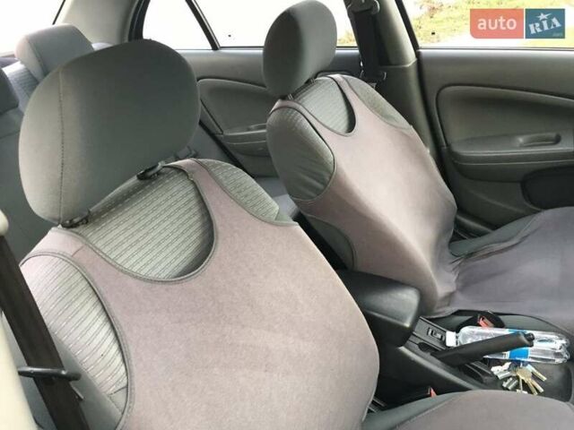 Зеленый Ниссан Альмера, объемом двигателя 1.6 л и пробегом 175 тыс. км за 5300 $, фото 4 на Automoto.ua