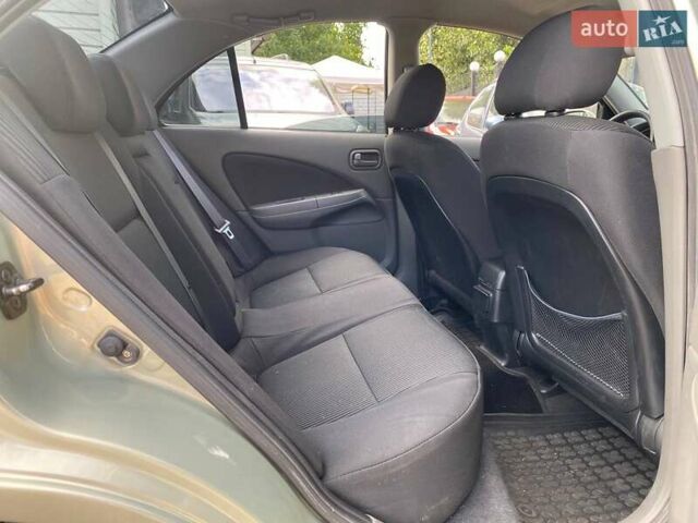 Зелений Ніссан Альмера, об'ємом двигуна 1.6 л та пробігом 75 тис. км за 5990 $, фото 10 на Automoto.ua