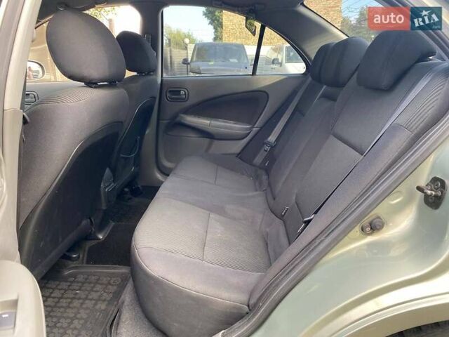 Зелений Ніссан Альмера, об'ємом двигуна 1.6 л та пробігом 75 тис. км за 5990 $, фото 9 на Automoto.ua