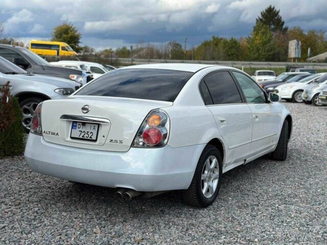 Білий Ніссан Альтіма, об'ємом двигуна 2.5 л та пробігом 200 тис. км за 3399 $, фото 1 на Automoto.ua