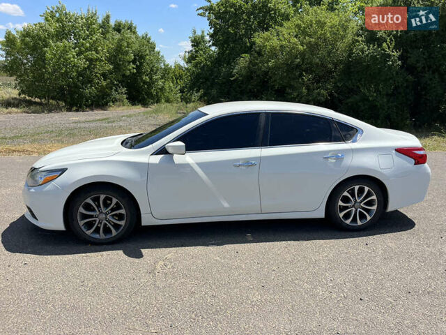 Білий Ніссан Альтіма, об'ємом двигуна 2.49 л та пробігом 192 тис. км за 10200 $, фото 23 на Automoto.ua