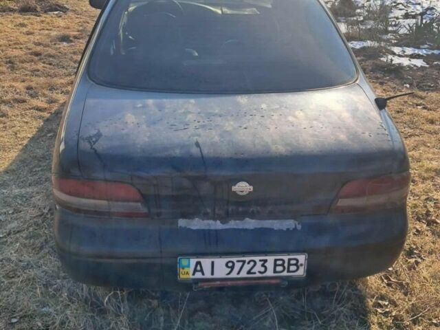 Черный Ниссан Альтима, объемом двигателя 2.4 л и пробегом 179 тыс. км за 700 $, фото 2 на Automoto.ua