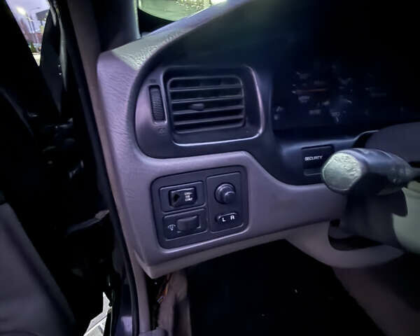 Черный Ниссан Альтима, объемом двигателя 2.4 л и пробегом 197 тыс. км за 3000 $, фото 9 на Automoto.ua