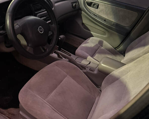 Черный Ниссан Альтима, объемом двигателя 2.4 л и пробегом 197 тыс. км за 3000 $, фото 16 на Automoto.ua