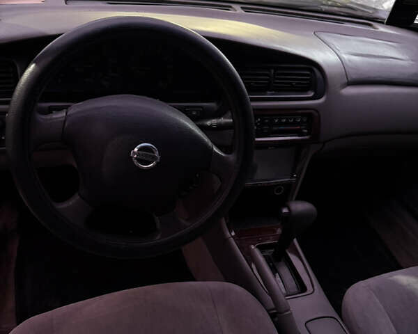 Черный Ниссан Альтима, объемом двигателя 2.4 л и пробегом 197 тыс. км за 3000 $, фото 15 на Automoto.ua