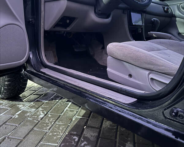 Черный Ниссан Альтима, объемом двигателя 2.4 л и пробегом 197 тыс. км за 3000 $, фото 6 на Automoto.ua