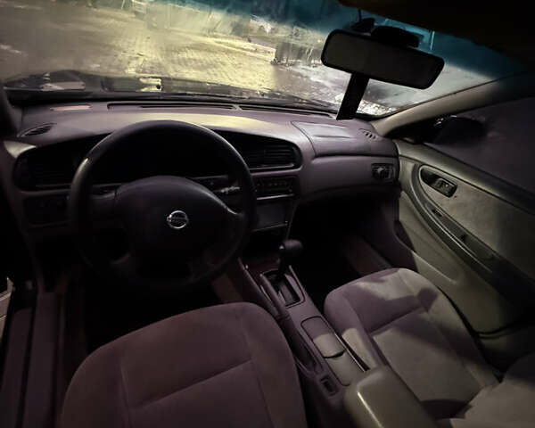 Черный Ниссан Альтима, объемом двигателя 2.4 л и пробегом 197 тыс. км за 3000 $, фото 14 на Automoto.ua