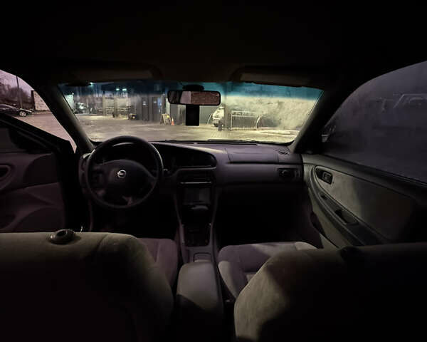 Черный Ниссан Альтима, объемом двигателя 2.4 л и пробегом 197 тыс. км за 3000 $, фото 12 на Automoto.ua