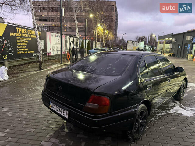 Черный Ниссан Альтима, объемом двигателя 2.4 л и пробегом 197 тыс. км за 3000 $, фото 2 на Automoto.ua