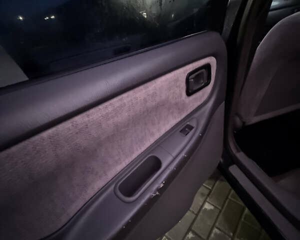 Черный Ниссан Альтима, объемом двигателя 2.4 л и пробегом 197 тыс. км за 3000 $, фото 11 на Automoto.ua