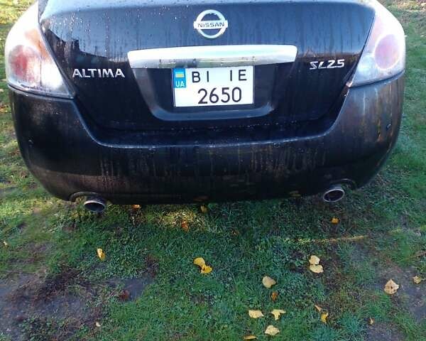 Чорний Ніссан Альтіма, об'ємом двигуна 2.49 л та пробігом 180 тис. км за 7000 $, фото 6 на Automoto.ua