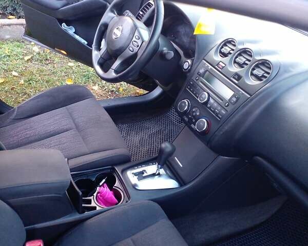 Чорний Ніссан Альтіма, об'ємом двигуна 2.49 л та пробігом 180 тис. км за 7000 $, фото 2 на Automoto.ua