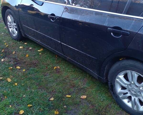 Чорний Ніссан Альтіма, об'ємом двигуна 2.49 л та пробігом 180 тис. км за 7000 $, фото 1 на Automoto.ua