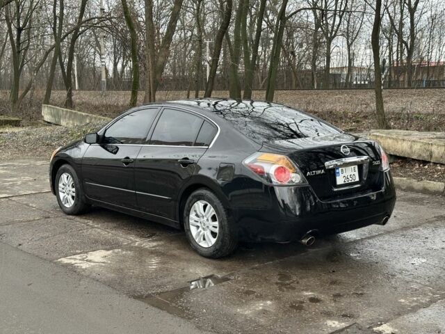 Чорний Ніссан Альтіма, об'ємом двигуна 2.5 л та пробігом 180 тис. км за 6500 $, фото 1 на Automoto.ua