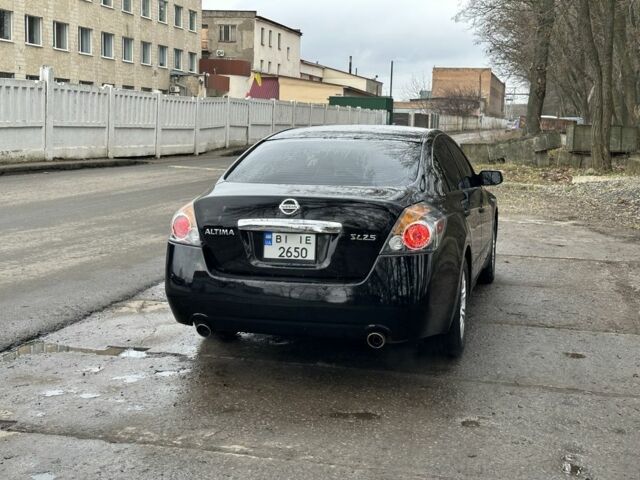 Чорний Ніссан Альтіма, об'ємом двигуна 2.5 л та пробігом 180 тис. км за 6500 $, фото 9 на Automoto.ua