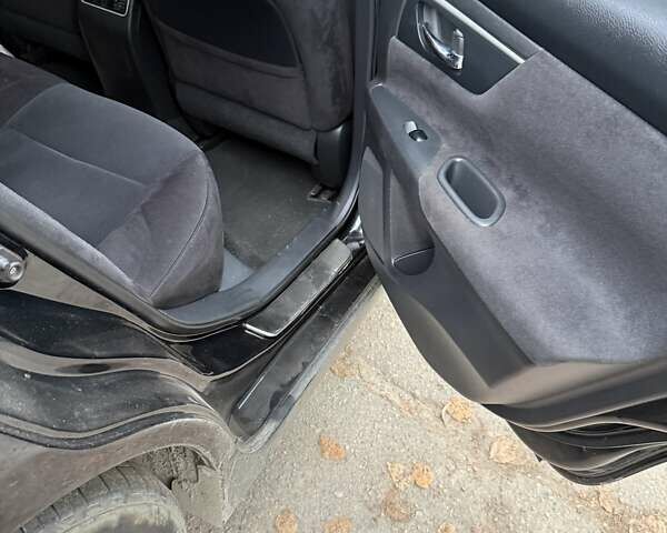 Черный Ниссан Альтима, объемом двигателя 2.5 л и пробегом 100 тыс. км за 10000 $, фото 6 на Automoto.ua