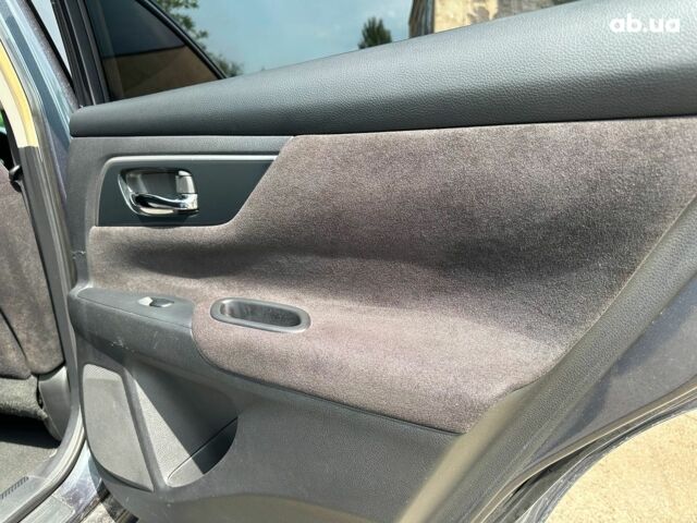 Черный Ниссан Альтима, объемом двигателя 2.5 л и пробегом 180 тыс. км за 9490 $, фото 14 на Automoto.ua