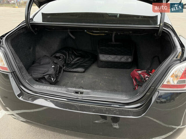 Черный Ниссан Альтима, объемом двигателя 2.49 л и пробегом 160 тыс. км за 9700 $, фото 7 на Automoto.ua