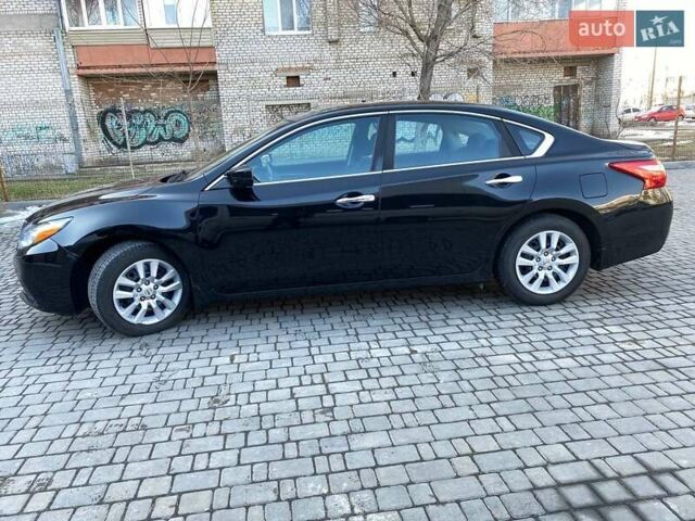 Черный Ниссан Альтима, объемом двигателя 2.49 л и пробегом 153 тыс. км за 8650 $, фото 38 на Automoto.ua