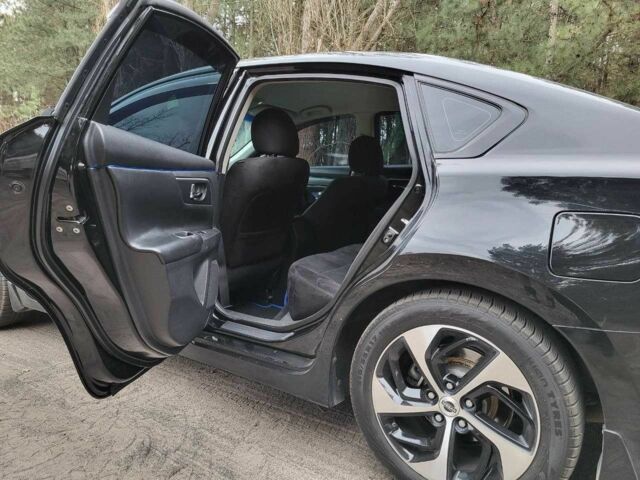 Черный Ниссан Альтима, объемом двигателя 2.5 л и пробегом 224 тыс. км за 8000 $, фото 8 на Automoto.ua